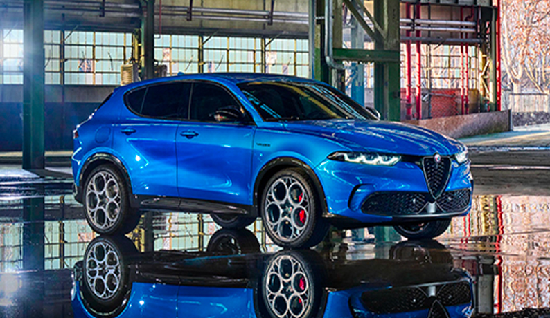 Misano Blue Alfa Romeo Tonale Side View in Warehouse